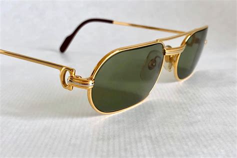 cartier 18k gold glasses|solid gold cartier glasses.